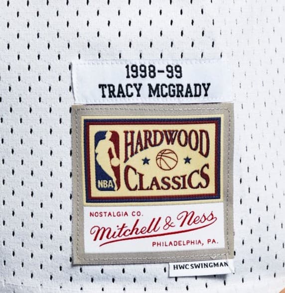 TRACY MCGRADY TORONTO RAPTORS MITCHELL AND NESS NBA HARDWOOD CLASSIC  SWINGMAN JERSEY- MENS WHITE